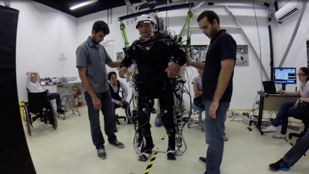 A person using various human augmentation technologies, including an exoskeleton and neural interface