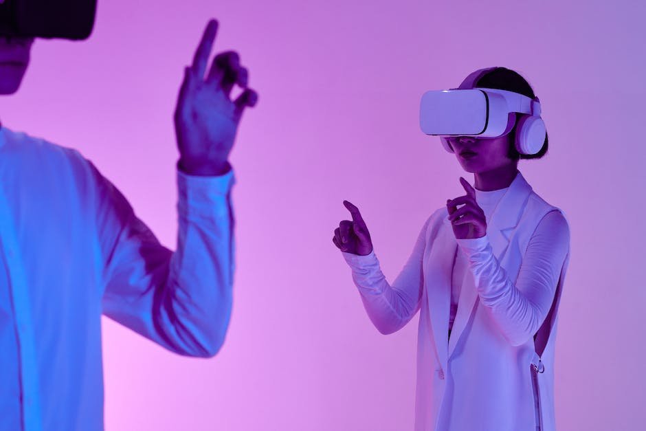 An image showing a person wearing a VR headset and interacting with a virtual environment
